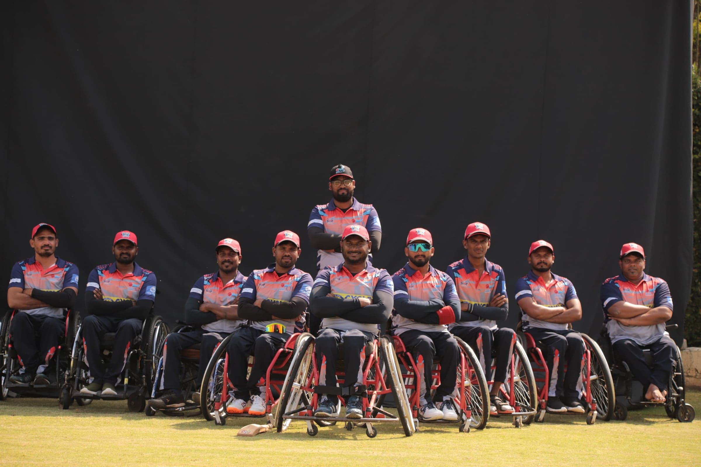 DMSA wheelchair cricket team posing together